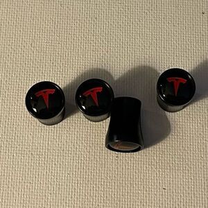 Tesla valve Stem caps in Black set of 4 NWT